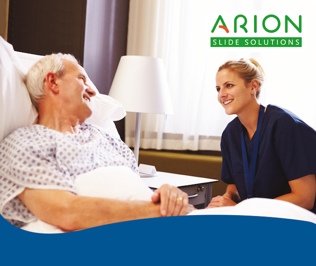 Patient and nurse smiling