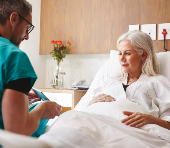 Nurse talking to patient