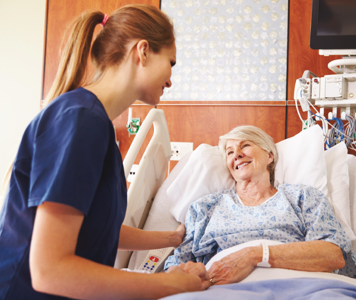 Patient and nurse smiling